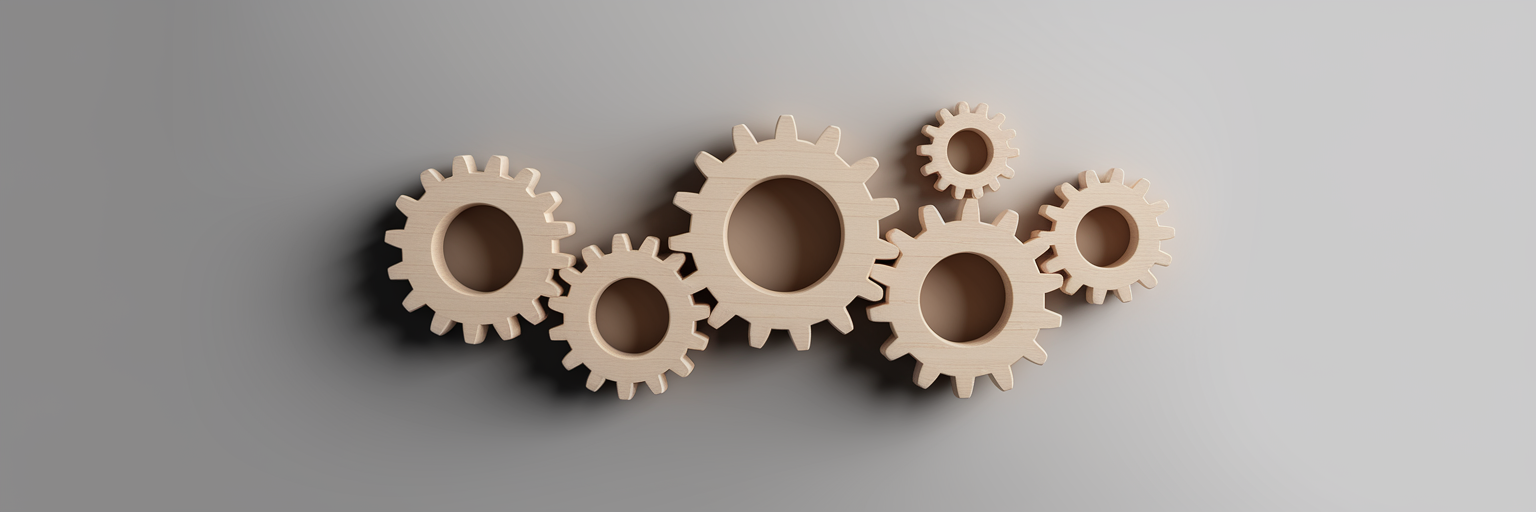 Interconnected wooden gears meshing together